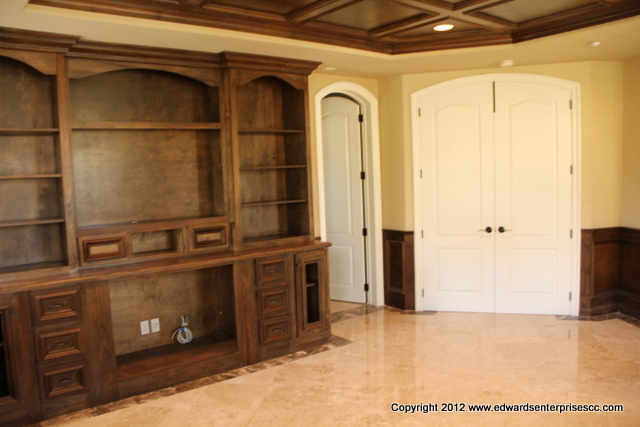 Moving and assembling home theater furniture.