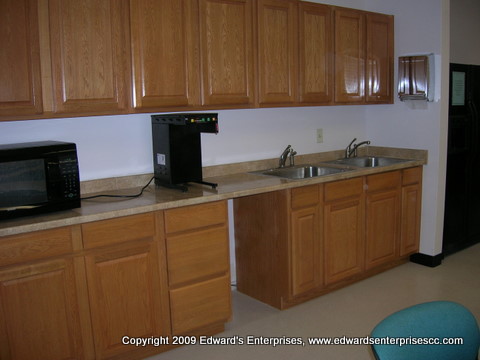 Carpentry projects: Break room cabinets cut and fitted to proper specifications.