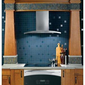A nice tile backsplash with a stainless steel hood mounted over the stove.