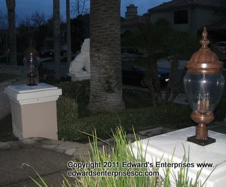 Entryway to a residential remodel project : Landscape Lighting and column top lights installed at a customer's home: Edward’s Enterprises Landscape Light.
