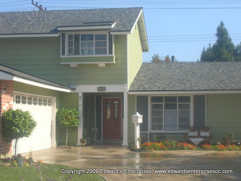 Residential Remodel Inside & Out After, Including: Paint Inside and Out, Roof, Front Facade, Laminate Flooring, Electrical, Tile Flooring, Landscaping, Doors Inside & Out, Drywall, Ceilings Scraped, Plumbing, and More.