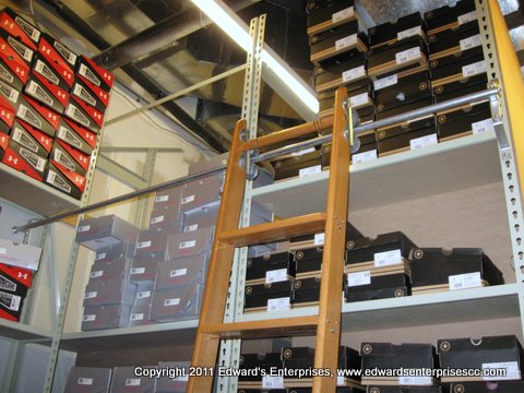 Multi-level retail rack at a shoe store chain.