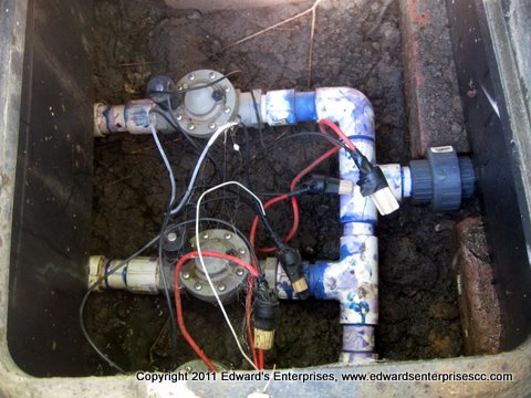 Edward’s Enterprises Sprinkler Service: Underground sprinkler system piping and fittings.