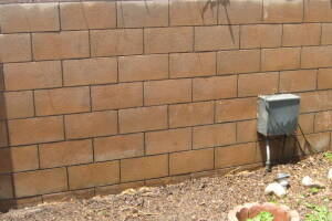 Landscaping Pressure Washing Concrete Wall - Landscaping