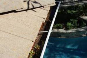 Landscaping Rain Gutter Debris Cleaning - Landscaping