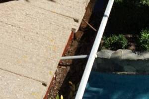 Landscaping Rain Gutter Debris Cleaning - Landscaping