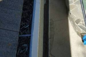Landscaping Rain Gutter Debris Cleaning - Landscaping