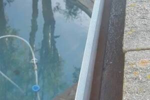 Landscaping Rain Gutter Debris Cleaning - Landscaping