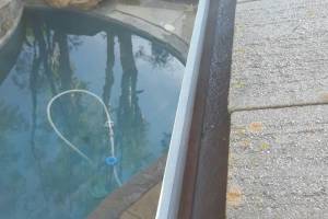 Landscaping Rain Gutter Debris Cleaning - Landscaping