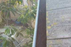 Landscaping Rain Gutter Debris Cleaning - Landscaping