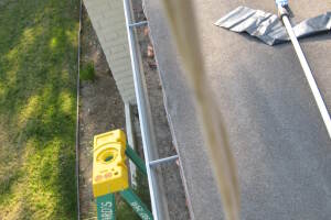 Landscaping Rain Gutter Leaves Debris Cleaning - Landscaping