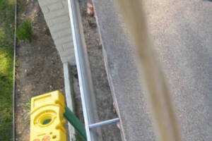 Landscaping Rain Gutter Leaves Debris Cleaning - Landscaping