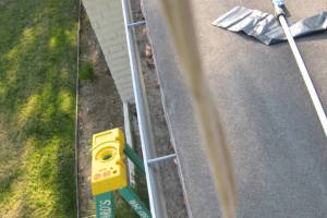 Landscaping Rain Gutter Leaves Debris Cleaning - Landscaping