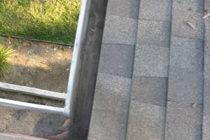Landscaping Rain Gutter Leaves Debris Cleaning - Landscaping