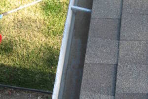Landscaping Rain Gutter Leaves Debris Cleaning - Landscaping