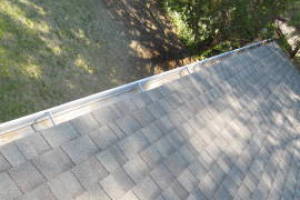 Landscaping Rain Gutter Leaves Debris Cleaning - Landscaping