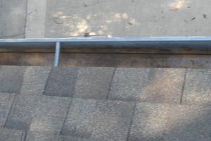 Landscaping Rain Gutter Leaves Debris Cleaning - Landscaping