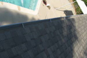 Landscaping Rain Gutter Leaves Debris Cleaning - Landscaping