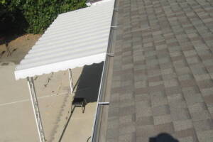 Landscaping Rain Gutter Leaves Debris Cleaning - Landscaping