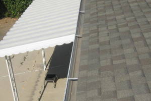 Landscaping Rain Gutter Leaves Debris Cleaning - Landscaping