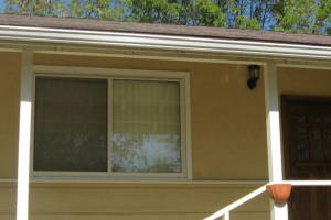 Landscaping Rain Gutter Tree Debris Cleaning - Landscaping