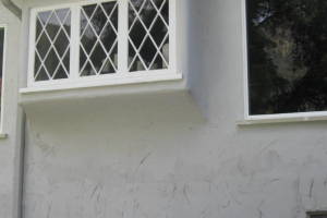 Painting Stucco Window Wall Cracks - Painting