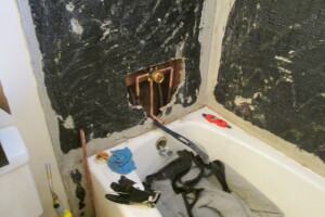 Plumbing Tub Shower Damage Remodel - Plumbing