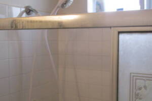 Repair Apartment Shower Door Leak - Repair