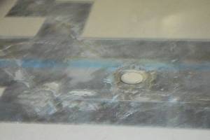 Repair Retail Floor Tile Replaced - Repair
