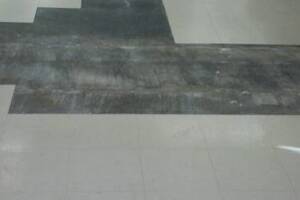 Repair Retail Floor Tile Replaced - Repair