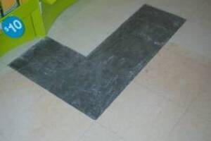Repair Retail Floor Tile Replaced - Repair