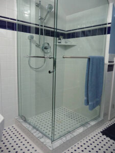 Corner shower with glass doors