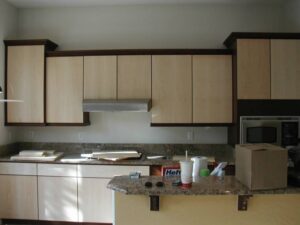 Kitchen with granite counter tops in the process of being remodeled.