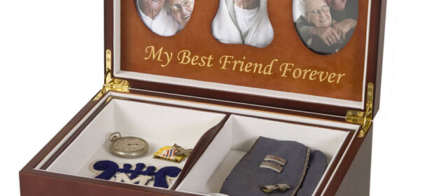 Wooden box with garrison cap, watch, and medal. Photo of elderly man: "My Best Friend Forever"