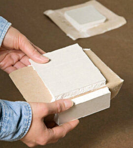 Drywall squares for use in patching drywall holes