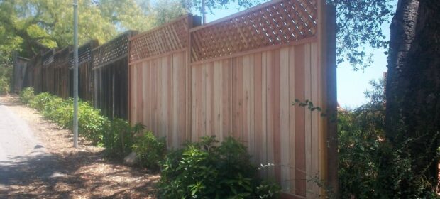 Fence with new extension installed at the end