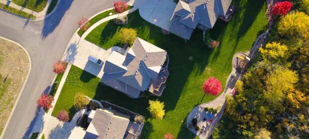 Bird's eye view of neighborhood with green lawns