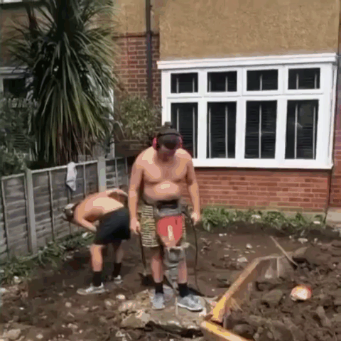 Man supporting jackhammer with his belly