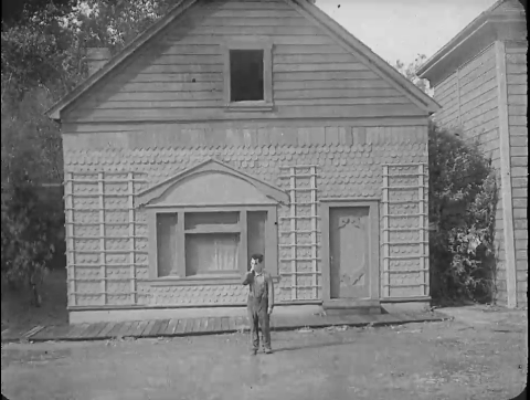 Buster Keaton's scene where front of house falls on him, but he's standing right where the window is