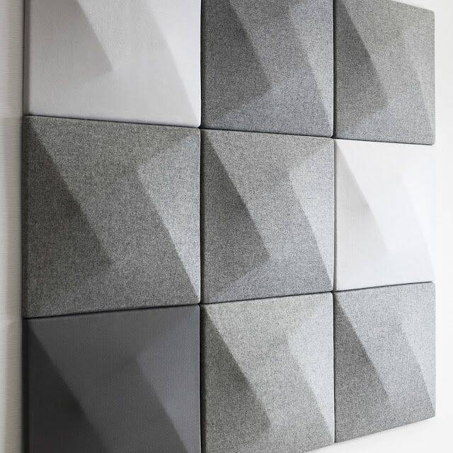 9x9 grid of fabric acoustic tile in varying greys