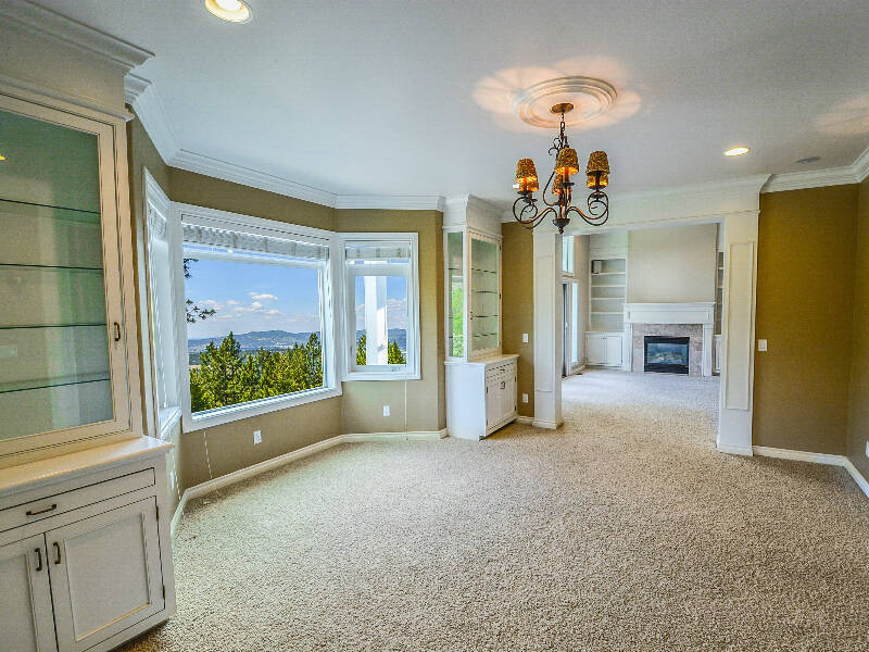 bay window in large, empty master bedroom