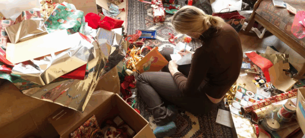Woman with holiday clutter